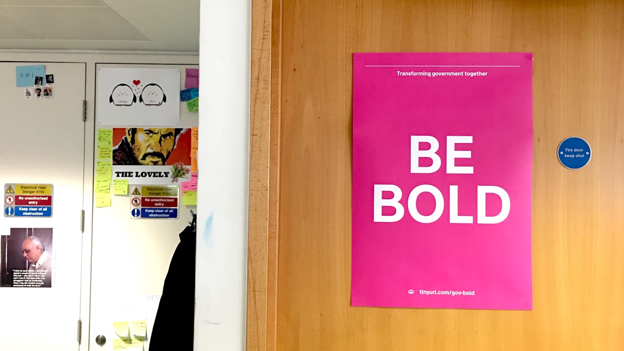 A poster with the words "Be bold"