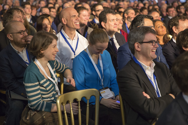 Photo of the audience at Sprint 14 laughing at something on the stage.