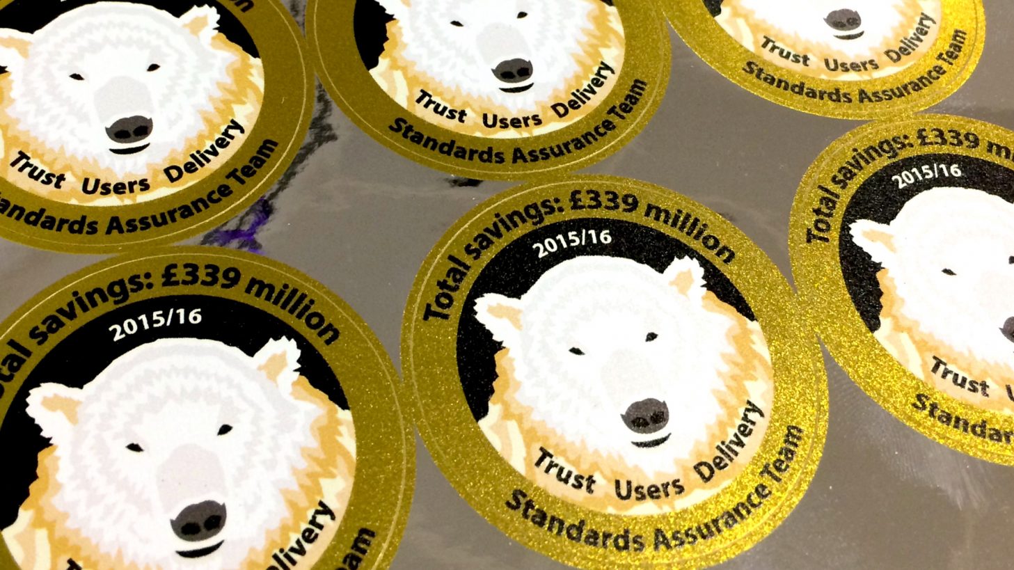 Stickers with a polar bear on them, saying: Total savings £39 million