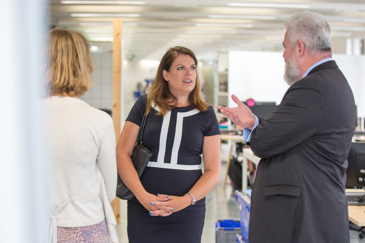 Parliamentary Under-Secretary of State Caroline Nokes in GDS offices, talking to two members of staff