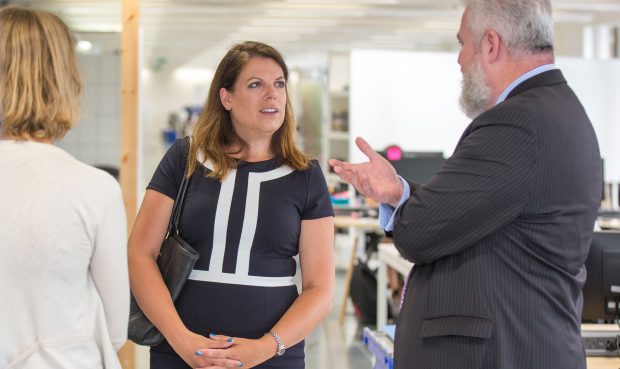 Caroline Nokes talking to 2 members of GDS staff