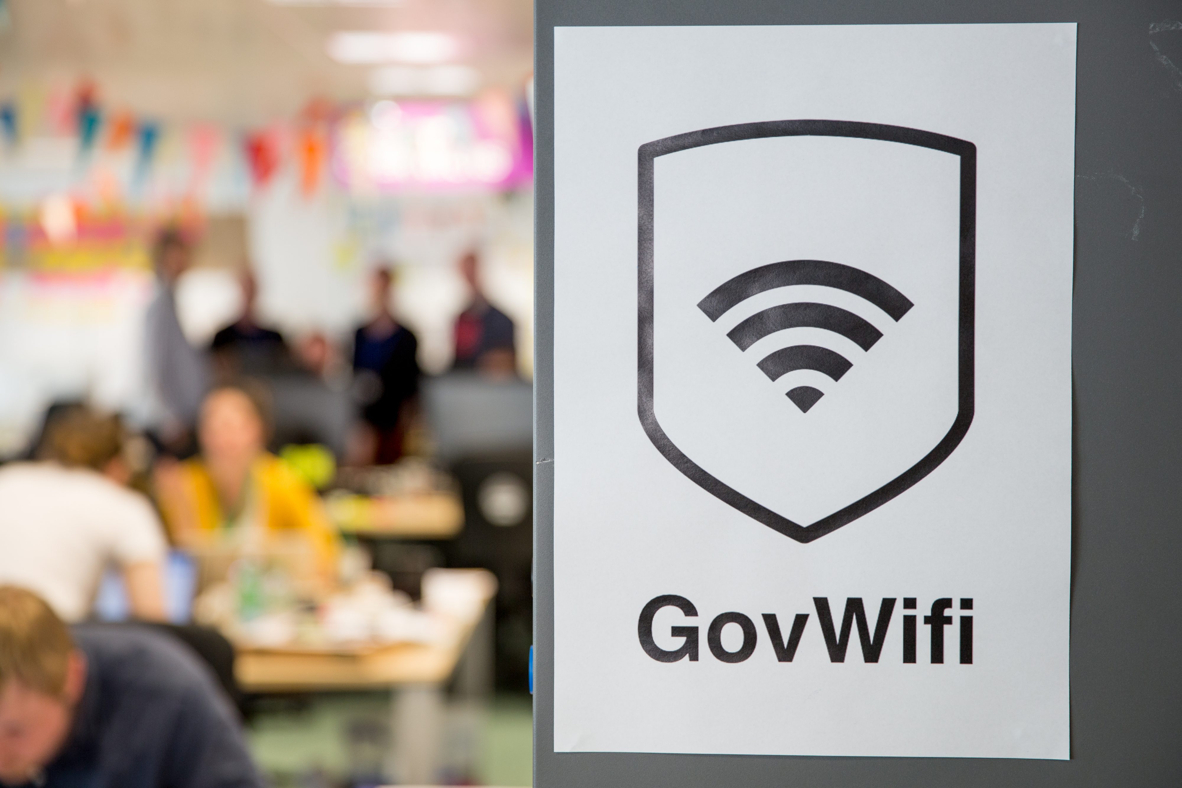 GovWifi poster and GDS office in the background