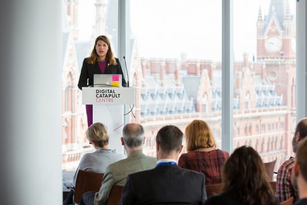 Caroline Nokes, Minister for Government Resilience and Efficiency speaking to a group of people on a stage