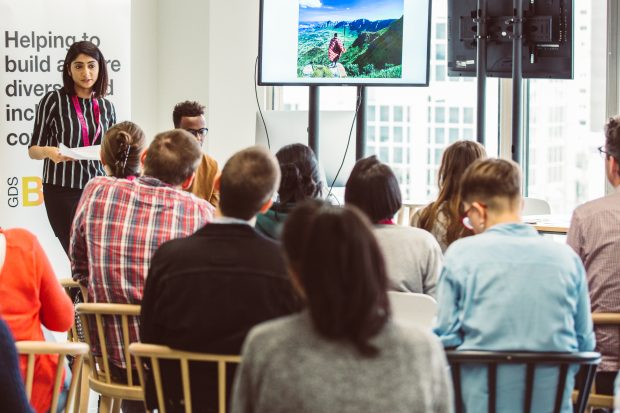 group of people listening to a talk