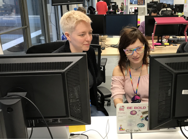 GDS staff pair programming, looking at a screen together