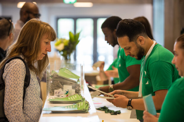 Sprint attendee at the registration desk