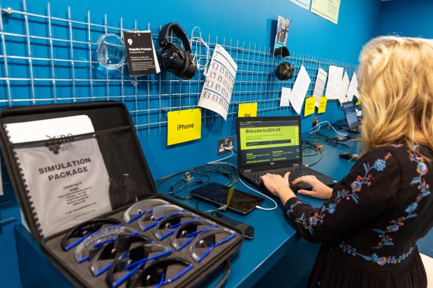 Staff member using the accessibility lab