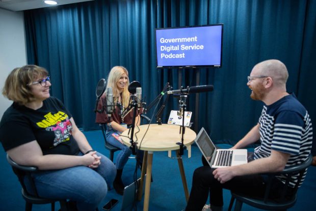 Liz Lutgendorff, Rosa Fox and Angus Montgomery sat at a table talking to each other