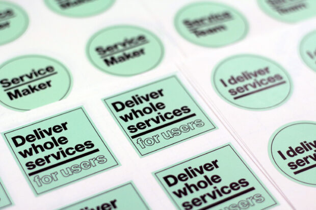 A sheet of Service Week stickers. One says "Service maker", another says "Deliver whole services for users" and a third says "I deliver services"