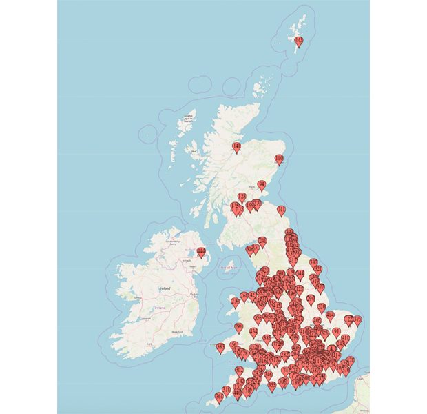 A map of the UK with dozens of red marks on it showing the locations of organisations that have GovWifi