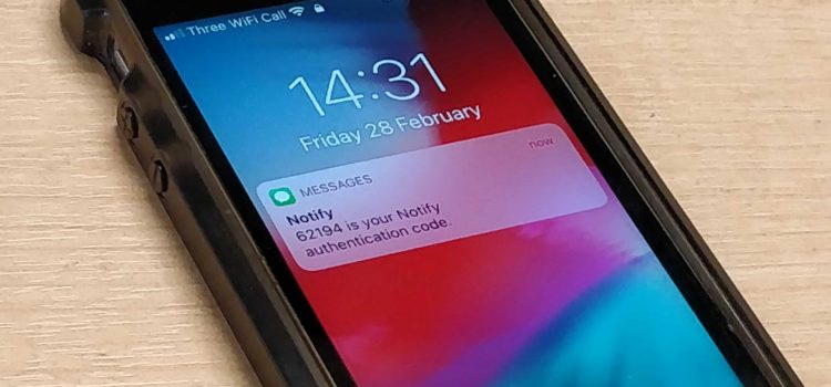 A mobile phone showing a notification of a text message having been received