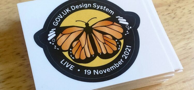 GOV.UK Design System live sticker with a picture of a monarch butterfly and the pass date (19 November 2021).
