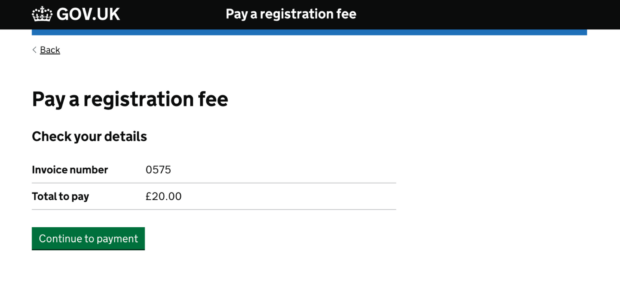 A GOV.UK Pay page. The title of the page is 'Pay a registration fee'. Underneath it says 'Check your details'. The invoice number and the total to pay is shown. At the bottom of the page there is a button saying 'Continue to payment'.